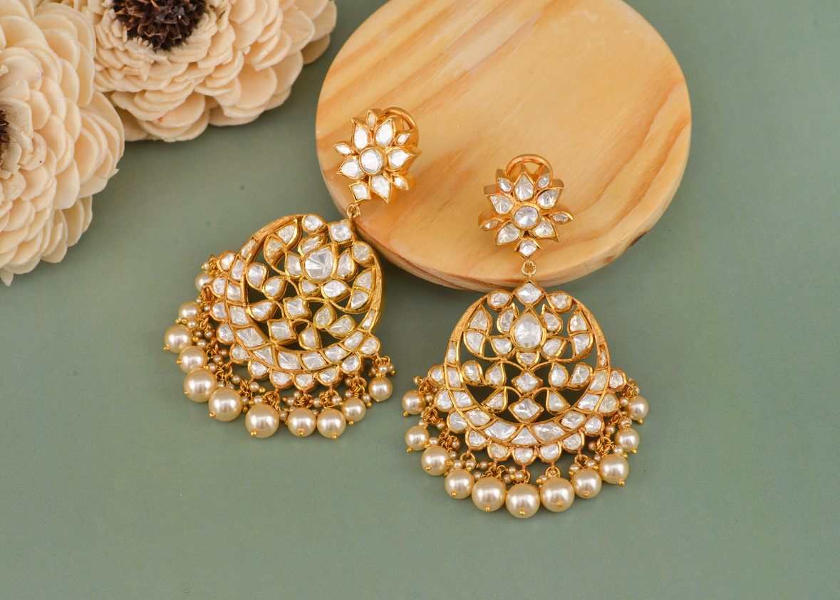 Close-Up Shot of Gold Plated Earrings